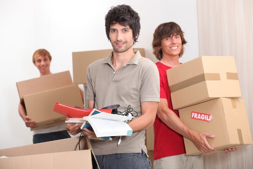 Unpacking boxes and arranging items in a new home