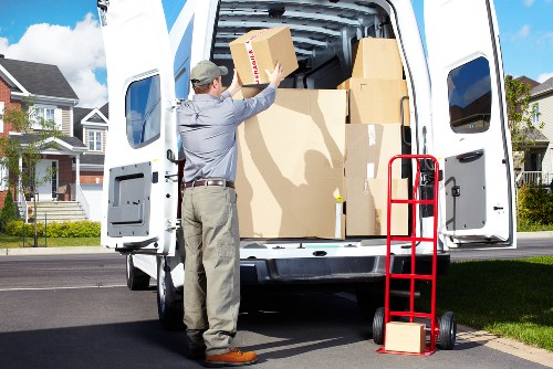 Packed furniture and boxes ready for transport during a Kingston move