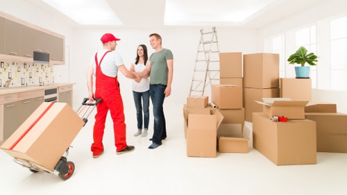 Furniture and boxes being loaded for a Kingston upon Thames removal job