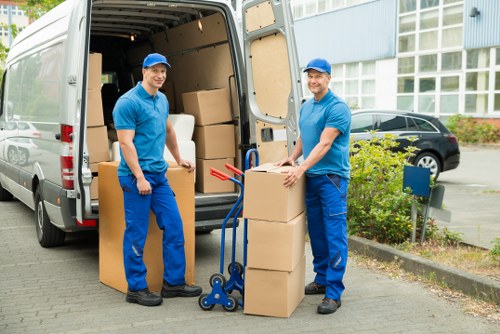 Careful handling of household items during a move in Kingston