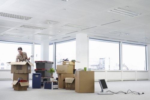 Household move preparation with packed boxes and furniture