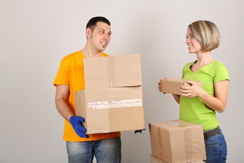 Moving team loading boxes into a van in Kingston upon Thames